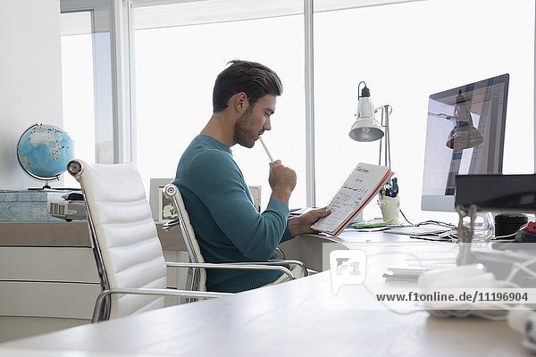 Young businessman working in an office