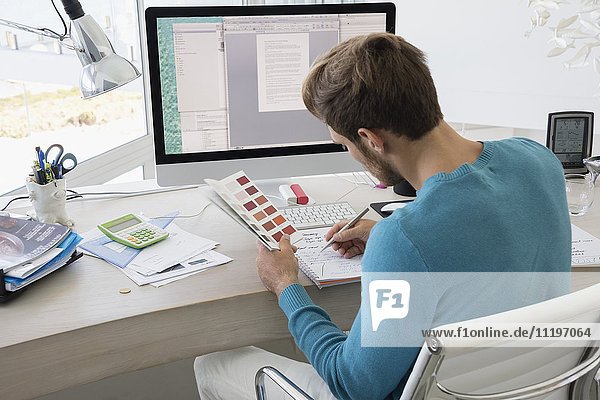 Young designer working in an office
