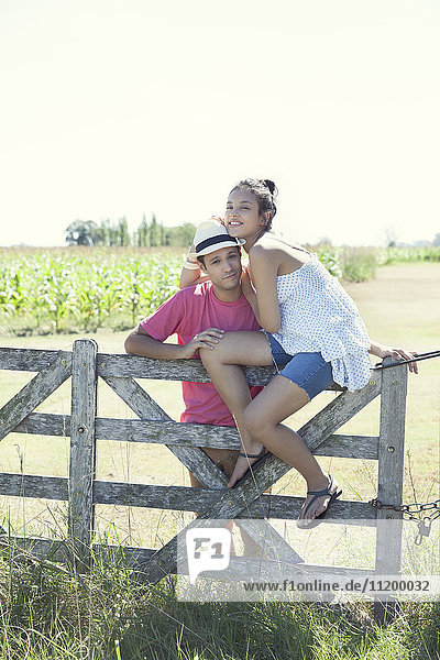 Young couple together on farm  portrait