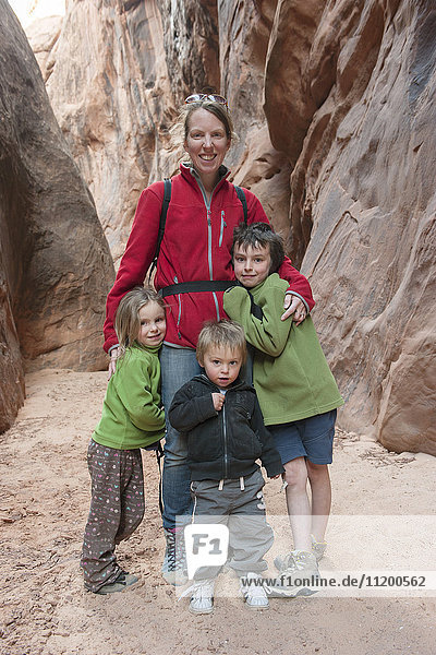 Mother and children hiking together  portrait