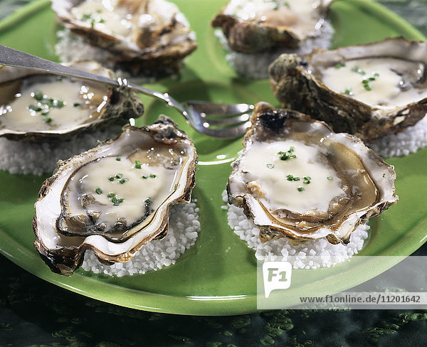 Hot oysters with chive cream
