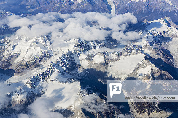 'Aerial view of the Tordrillo Mountains  and glaciers running between them  Alaska Range  South-central Alaska; Alaska  United States of America'