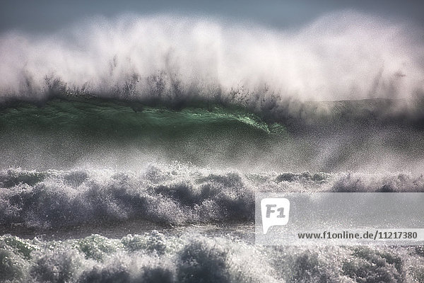 'Large waves from the South Atlantic Ocean pound the shore of Cape Good Hope; South Africa'