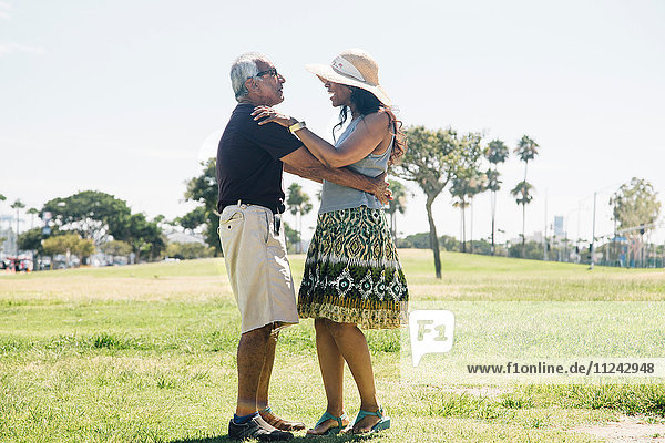 Senior couple dancing outdoors  Long Beach  California  USA