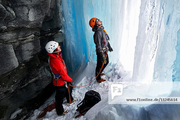 Couple in cave ice climbing  Saas Fee  Switzerland