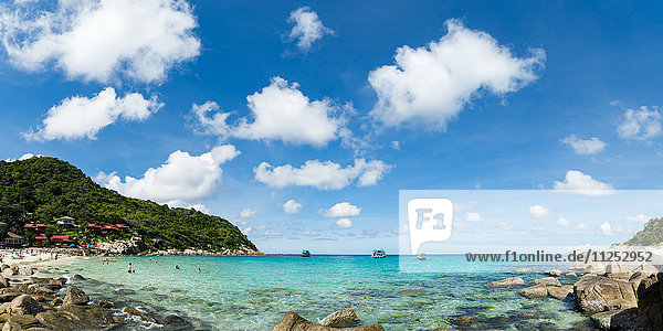 Toursits enjoy the clear water and sun at a beach on the Thai island of Koh Tao  Thailand  Southeast Asia  Asia