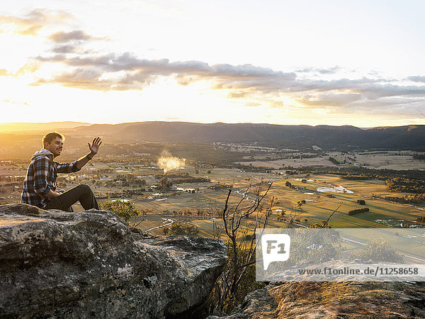 Australia  New South Wales  Man waving on Mount York