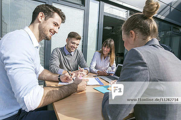 Group of business people working together in meeting