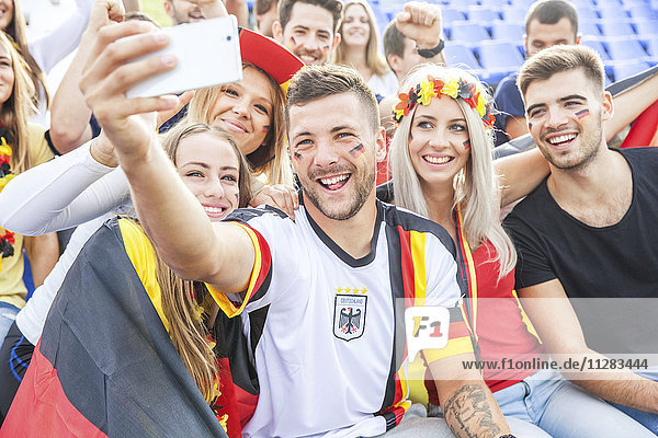 Group of German soccer fans taking a selfie