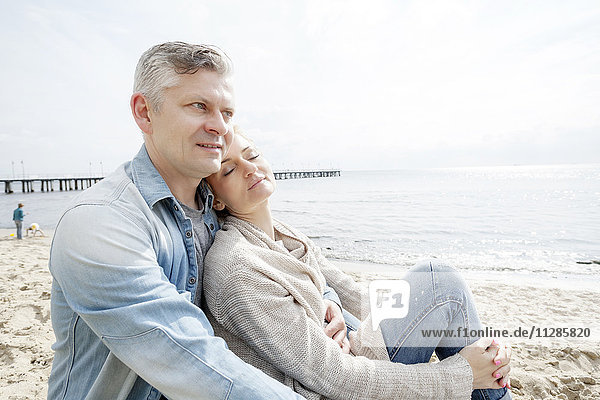 Portrait of couple in love on beach