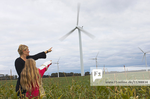 Mother and Daughter Looking at Wind Turbines  Denmark