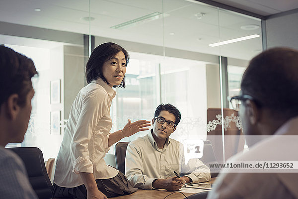 Business people in meeting having interesting discussion