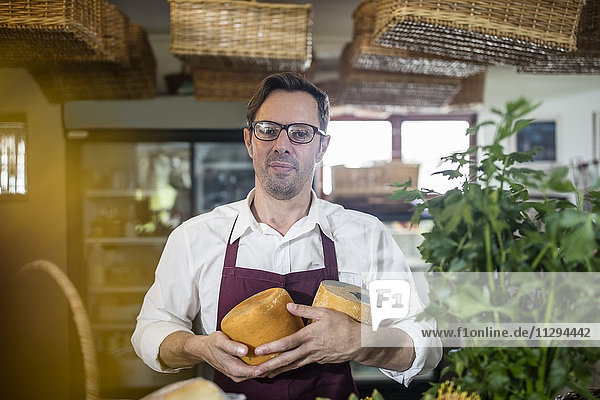 Portrait of grocer in a farm shop