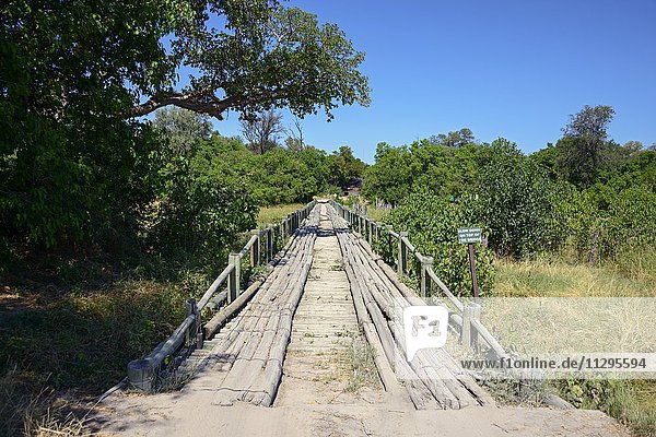 Simply built wooden bridge over the River Khwai  Botswana  Africa