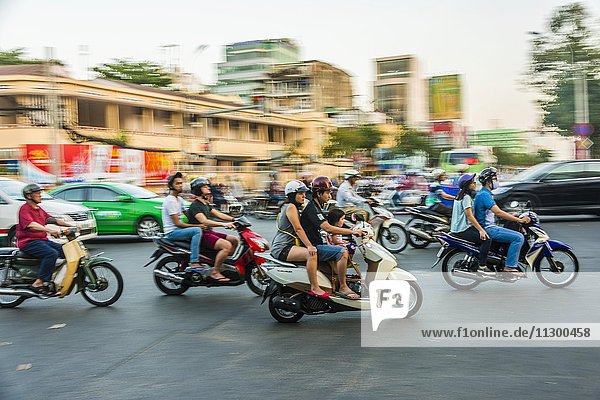 Scooter drivers in heavy traffic  motion blur  Ho Chi Minh City  Vietnam  Asia