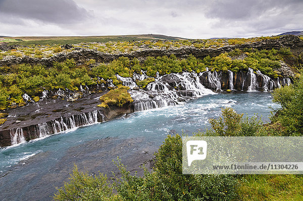 The waterfalls Hraunfossar of the river Hvita near the village Husafell in west Iceland.
