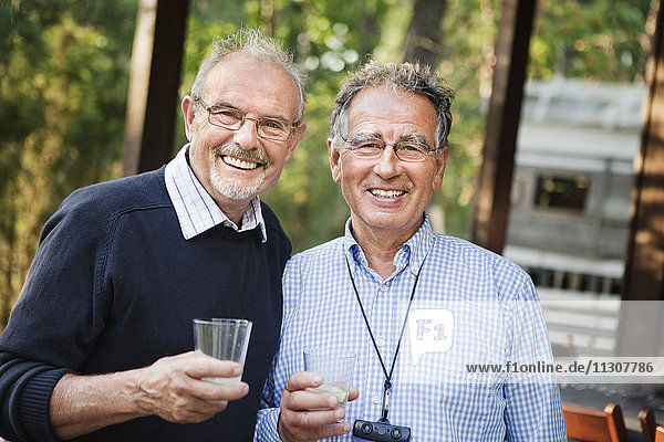 Two smiling senior men