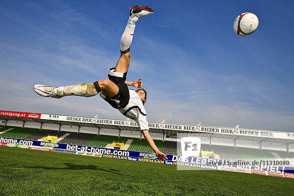 Football  Soccer  action  sport  bicycle kick  overhead kick  scissor kick  ball  man