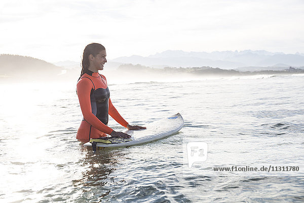 Female surfer in the water