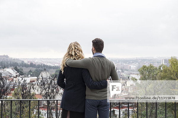 Spain  Madrid  couple looking at the city