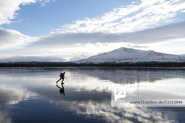 Young man moving on ice