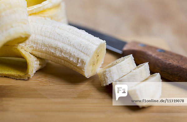 Sliced banana on wood