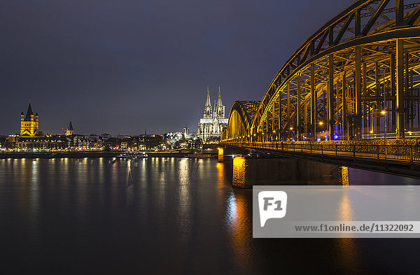 Germany  Cologne  view to Gross Sankt Martin  Cologne Cathedral and Hohenzollern Bridge by night