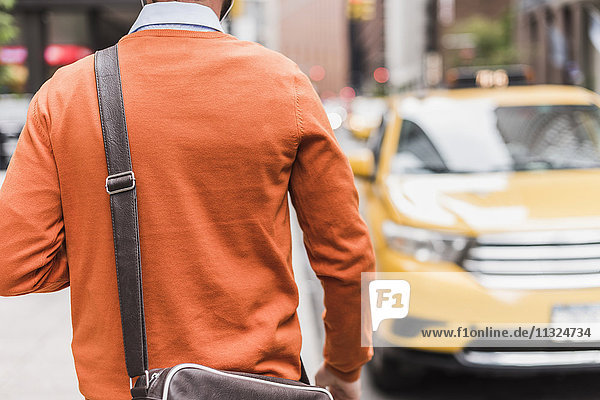 USA  New York City  Businessman approaching cab