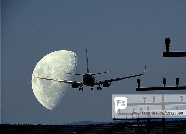 landing jet and moon
