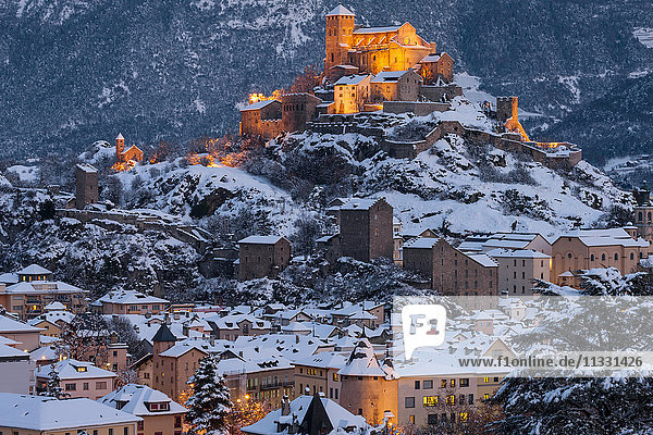 Sion city in Valais in winter by night