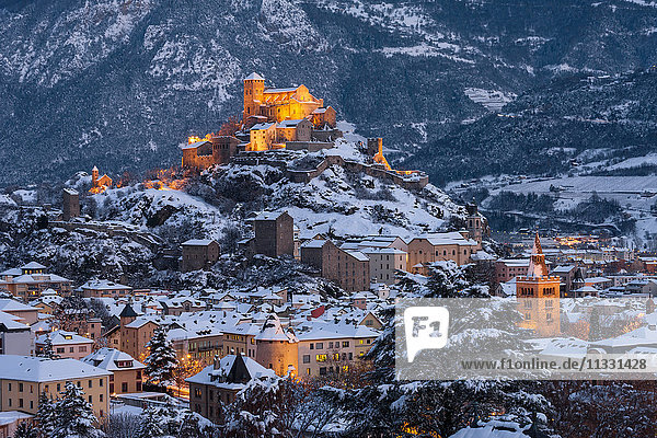 Sion city in Valais in winter by night