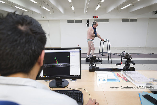 Reportage on the Rossetti health centre in Nice  France. This rehabilitation centre is a hub of excellence with cutting-edge technology. Seen here  a quantified motion analysis test carried out in the Clinical Motion Analysis Unit  a technical platform enabling a better understanding of walking anomalies. The patient is following a rehabilitation program following a stroke.