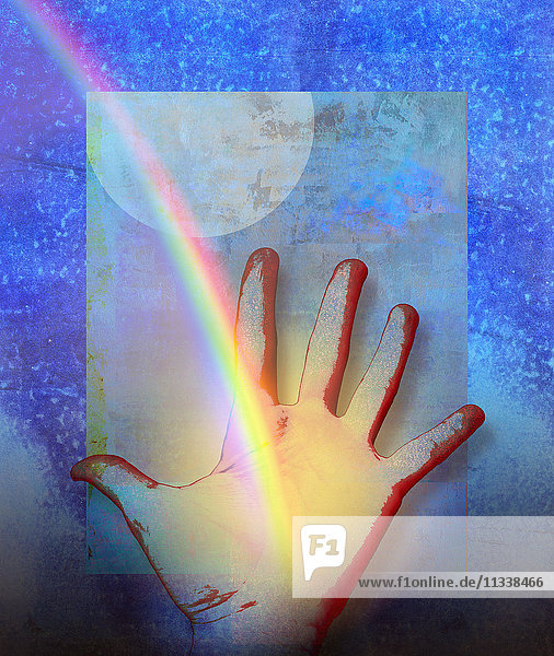 Das Ende des Regenbogens auf ausgestreckter Hand