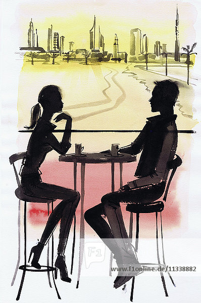 Young couple in cafe silhouetted against Dubai cityscape