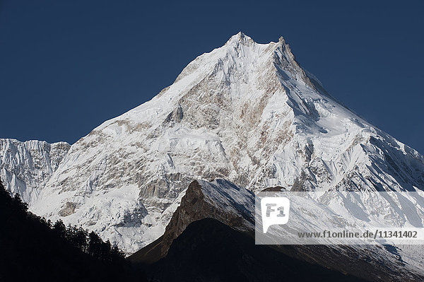 At 8156m Manaslu is the eighth highest mountain in the world and a magnificent sight Nepal Himalayas Asia
