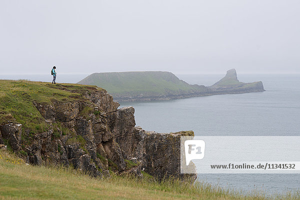 Looking towards Worms Head from Rhossili Bay on The Gower  South Wales  United Kingdom  Europe