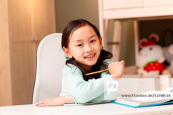 Little girl in learning
