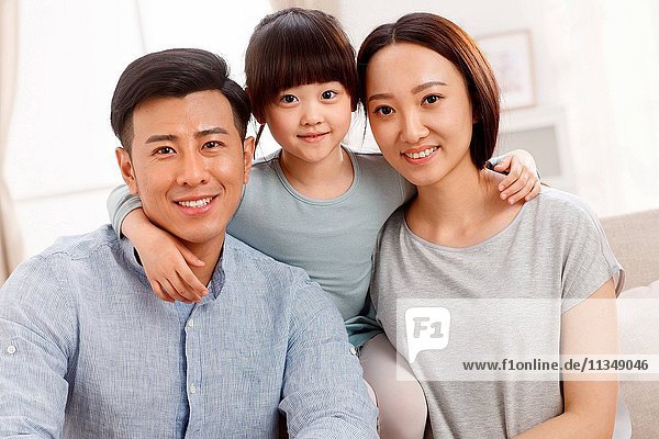 A happy family of three photo