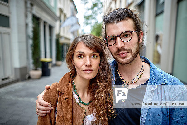 Portrait of young couple in the city