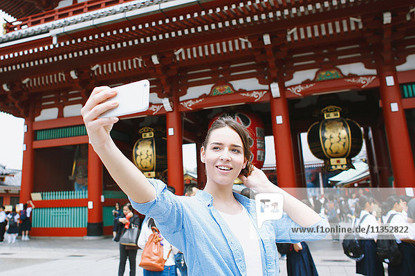Caucasian woman enjoying sightseeing in Tokyo  Japan