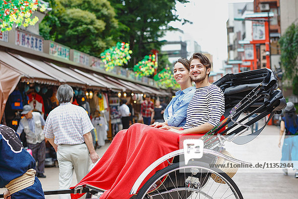 Caucasian couple enjoying sightseeing in Tokyo  Japan