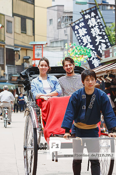 Caucasian couple enjoying sightseeing in Tokyo  Japan