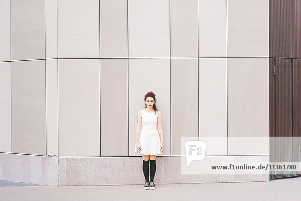 Full length portrait of woman in front of building  Milan  Italy