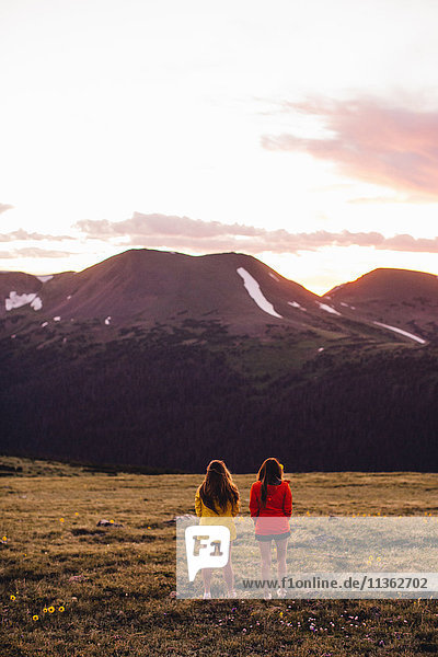 Rear view of women looking at view of mountains  Rocky Mountain National Park  Colorado  USA