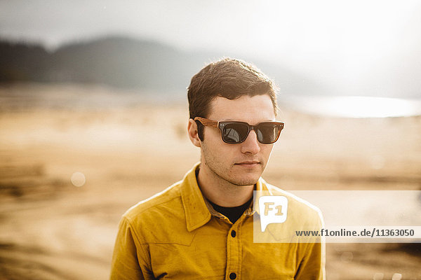 Portrait of young man wearing sunglasses  Huntington Lake  California  USA