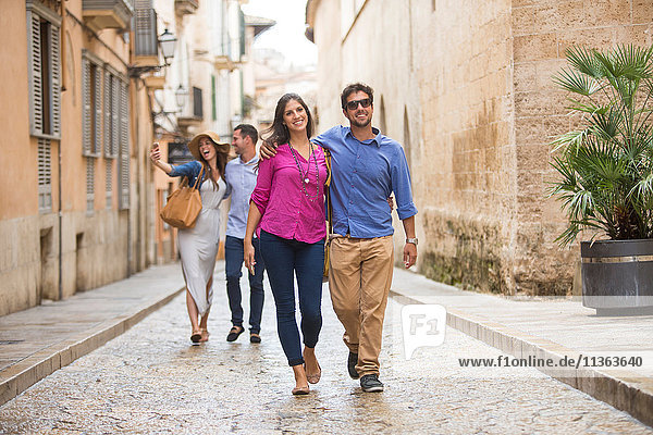 Couples walking on street  Palma de Mallorca  Spain