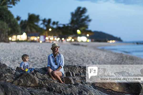 Mother with son on beach