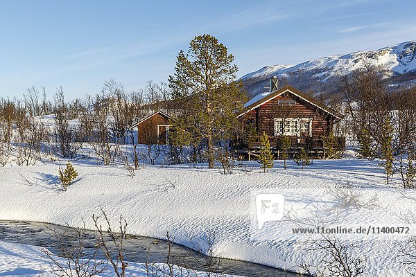 Wooden house  Botnelva River in winter  Aspevatnet  Lyngen Municipality  Troms Province  Norway  Europe