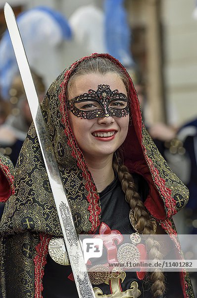 Woman in historic clothes  Moors and Christians Parade  Moros y Cristianos  Jijona or Xixona  Province of Alicante  Costa Blanca  Spain  Europe