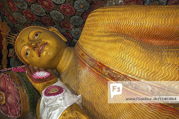 Reclining Buddha statue  Aluvihara Rock Cave Temple  Central Province  Sri Lanka  Asia